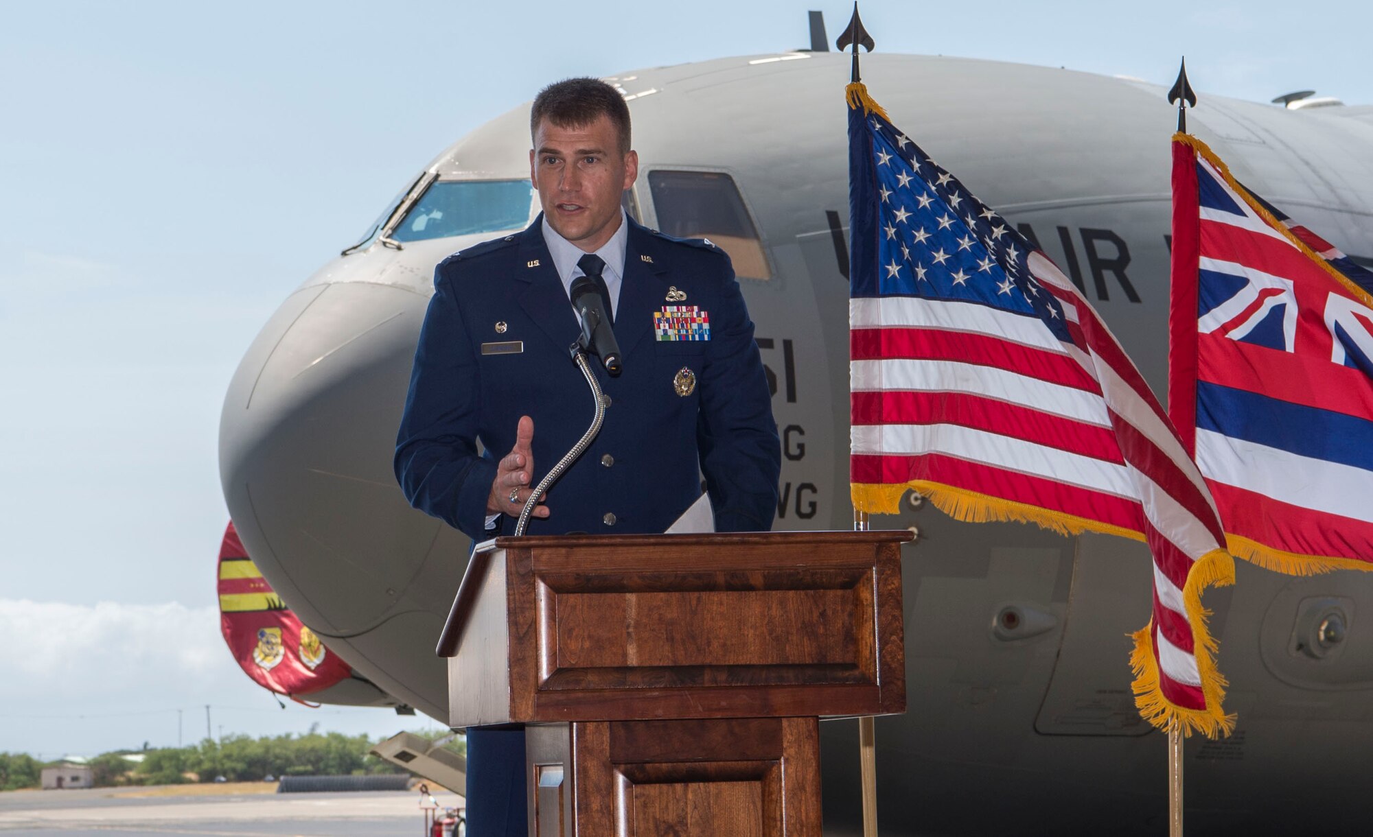 Col. Dominic Clementz, 15th Maintenance Group commander, gives the closing remarks during the MXG change of command ceremony, Joint Base Pearl Harbor-Hickam, Hawaii, July 16, 2018. The MXG supports 31 home station aircraft to meet global airlift, global strike and theater security mission requirements and provides support to over 7,200 joint and allied aircraft transiting through Hickam Field each year. (U.S. Air Force photo by Tech. Sgt. Heather Redman)