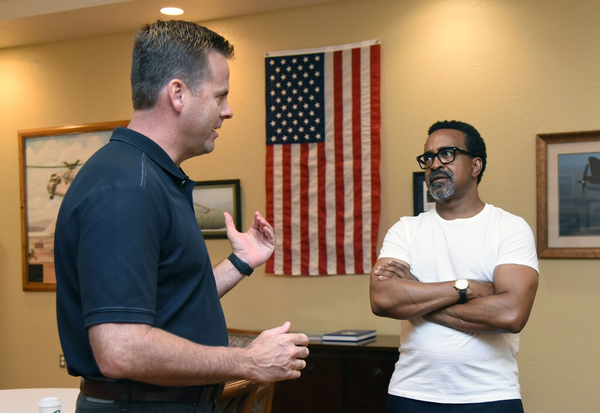 U.S. Air Force Col. Lance Burnett, 81st Training Wing vice commander, welcomes Tim Meadows, actor and comedian, prior to a performance at the Bay Breeze Event Center at Keesler Air Force Base, Mississippi, July 14, 2018. Meadows is also an alumni of the late-night comedy show, Saturday Night Live. (U.S. Air Force photo by Kemberly Groue)