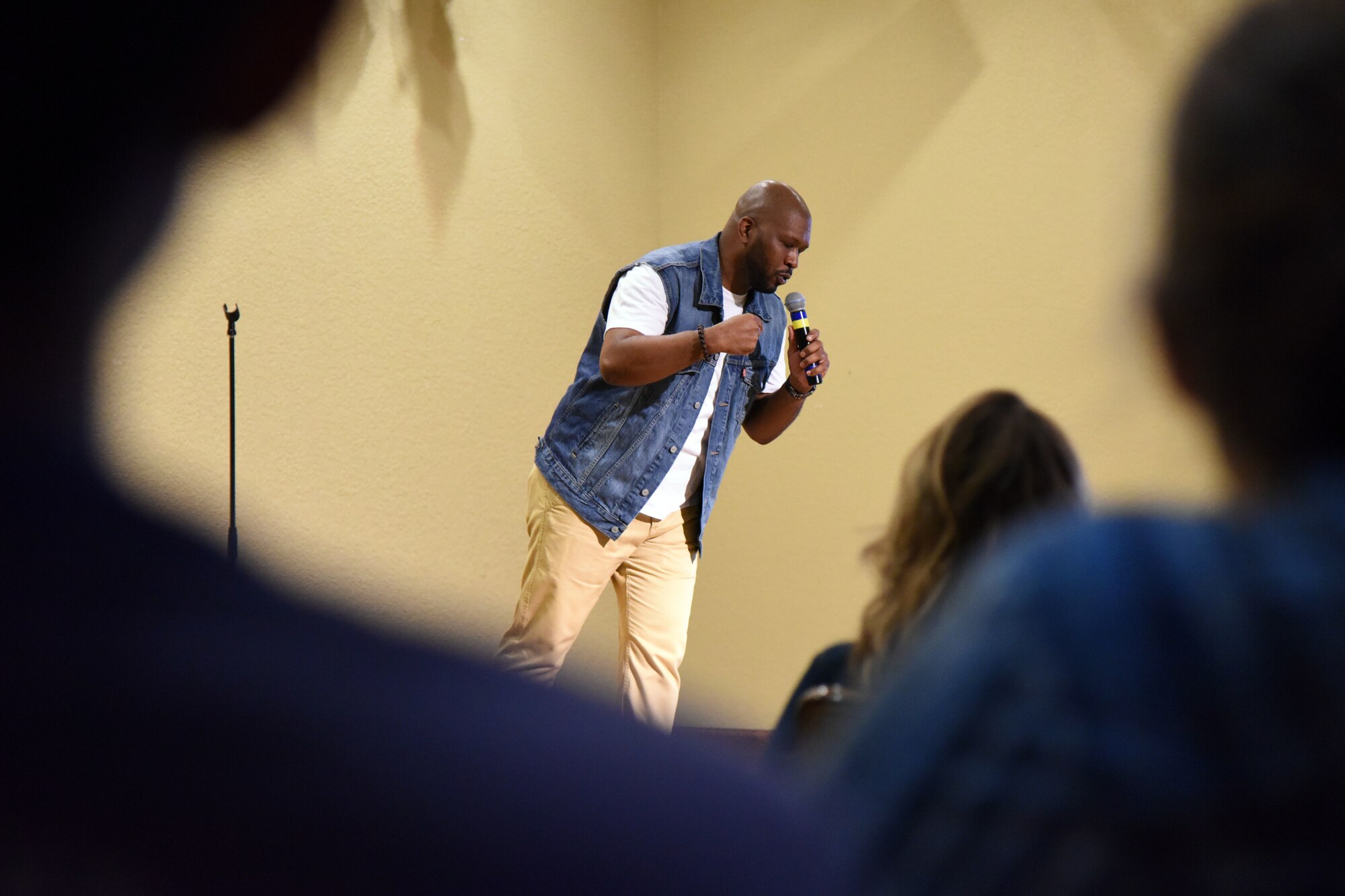 Walter Campbell, comedian, performs for Keesler personnel at the Bay Breeze Event Center at Keesler Air Force Base, Mississippi, July 14, 2018. Campbell was a featured act for Tim Meadows, actor and comedian, who is also an alumni of the late-night comedy show, Saturday Night Live. (U.S. Air Force photo by Kemberly Groue)