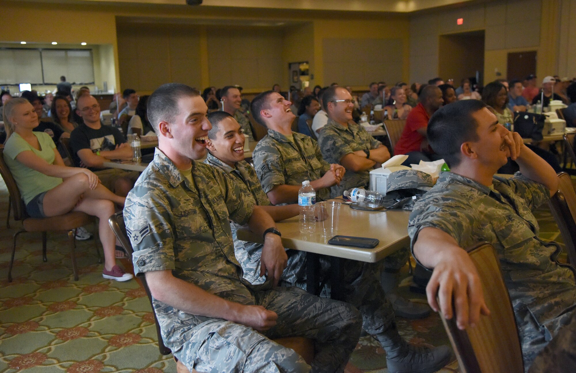 Airmen from the 81st Training Group attend the Tim Meadows comedy show at the Bay Breeze Event Center at Keesler Air Force Base, Mississippi, July 14, 2018. Meadows is an alumni of the late-night comedy show, Saturday Night Live. (U.S. Air Force photo by Kemberly Groue)