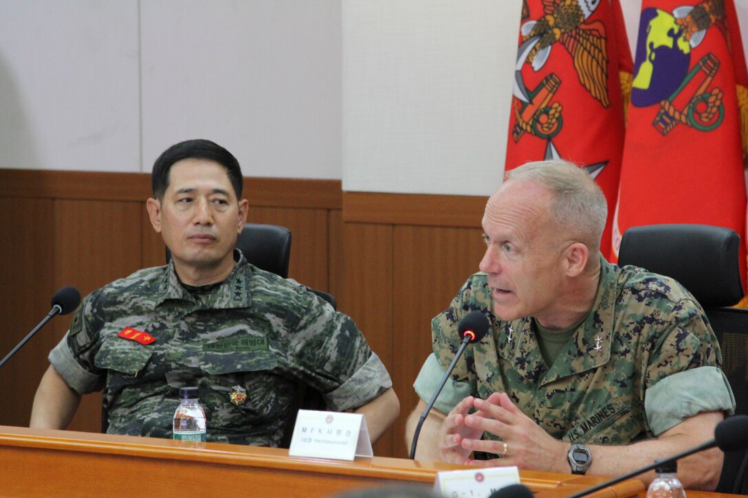 BARAN-RI, South Korea – Maj. Gen. Patrick J. Hermesmann (right), commander of U.S. Marine Corps Forces Korea, and Lt. Gen. Jun, Jin Goo, commandant of the Republic of Korea Marine Corps, speak to their staff here, July 3. The ROKMC and UMSC signed an agreement that strengthened their services’ relationship and interoperability. (Official U.S. Marine Corps photo by Staff Sgt. Anthony Kirby/Released)