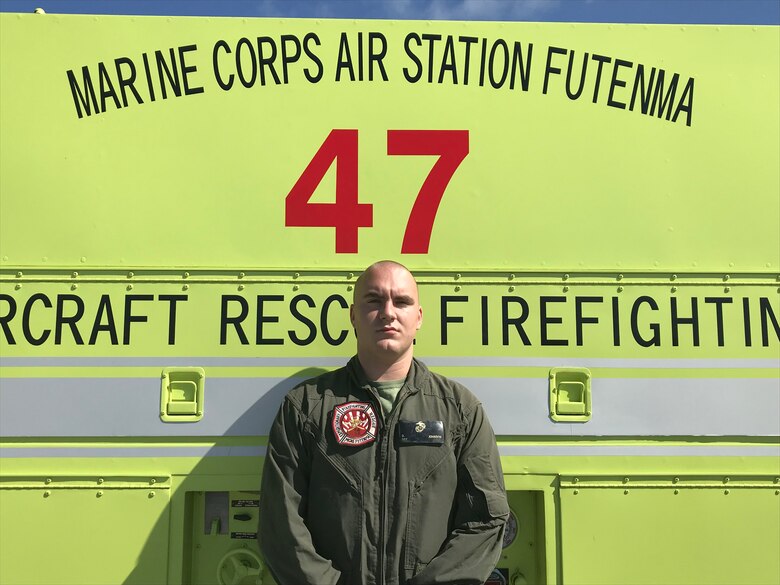 Sgt. Daniel Johnson poses for a photo July 16 at Ie Shima Training Facility.