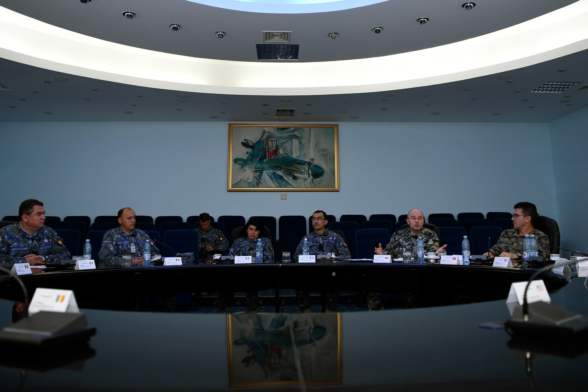 Senior enlisted leaders from the Romanian, Bulgarian and Turkish Air Forces converse during the Romanian air force’s International SEL Visit at Bucharest, Romania, July 10, 2018.