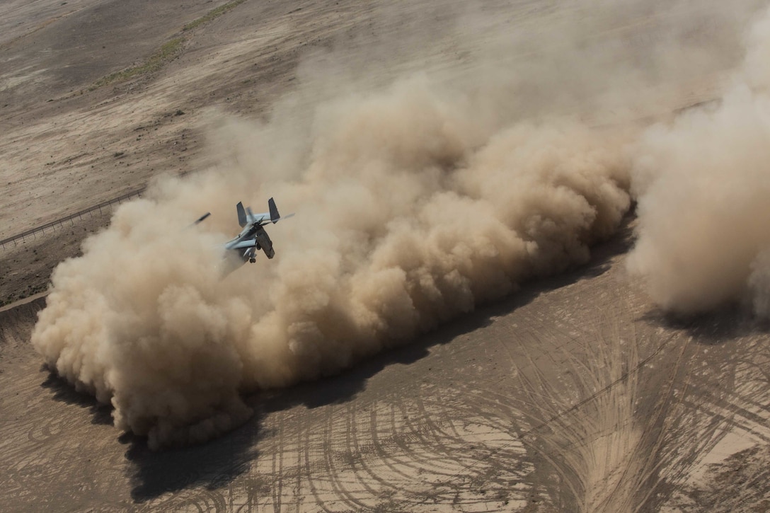 A U.S. Marine Corps MV-22B Osprey takes off during a resupply mission in support of Combined Joint Task Force – Operation Inherent Resolve at Firebase Um Jorais, Iraq, June 23, 2018. CJTF-OIR is the military arm of the Global Coalition to defeat ISIS in designated parts of Iraq and Syria.