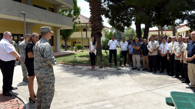 U.S. Air Force Col. Britt Hurst, 39th Air Base Wing commander, congratulates 39th FSS lodging team for winning the 2018 Air Force Innkeeper Award at Incirlik Air Base, Turkey, July 18, 2018.