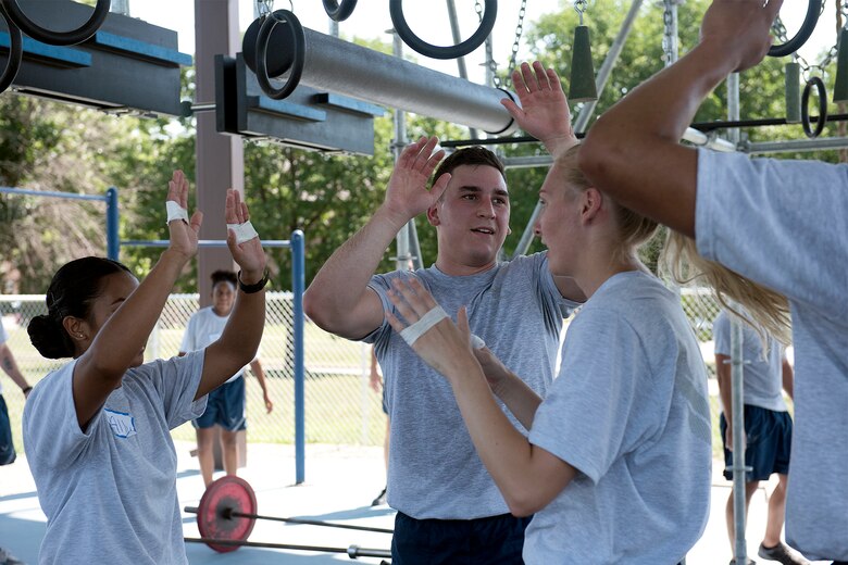 .S. Air Force Physical Training Leaders participate in an Alpha Warrior Battle Rig training course July 10-11, 2018, at Whiteman Air Force Base, Missouri. The PTLs from Scott AFB in Illinois and McConnell AFB in Kansas joined PTLs from Whiteman AFB in a two-day course to become certified on the equipment in order to integrate the battle rig into unit physical training sessions. Units at Whiteman can use the Alpha Warrior Battle Rig during group workouts with a certified member present. The Whiteman Fitness Center will be starting Alpha Warrior Battle Rig classes in August 2018 for Airmen . For more information, contact the Fitness Center at 660-687-5496. (U.S. Air Force photo by Airman 1st Class Taylor Phifer)