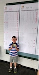 Levi Hayden displays award from National Drive, Chip and Putt Competition