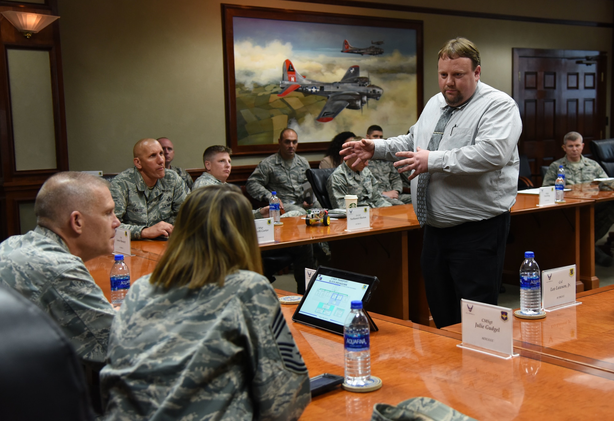 Brandon Dusin, 338th Training Squadron training manager, explains how 81st Training Group squadrons are implementing Continuum of Learning strategies into the classrooms to U.S. Air Force Lt. Gen. Steven Kwast, Air Education and Training Command commander, and Chief Master Sgt. Julie Gudgel, AETC command chief, at Stennis Hall during an immersion tour at Keesler Air Force Base, Mississippi, July 16, 2018. Kwast and Gudgel also received a tour of the Levitow Training Support Facility and the Keesler Medical Center to become more familiar with Keesler’s mission. (U.S. Air Force photo by Kemberly Groue)