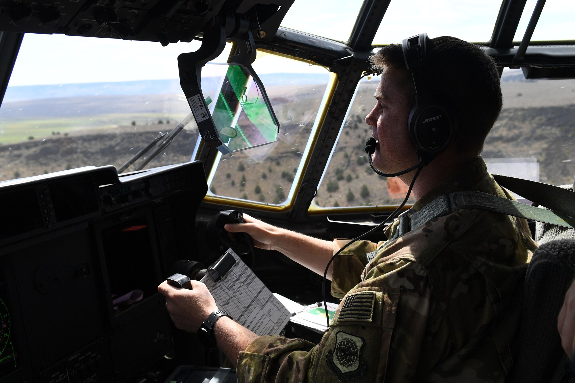 Airman flies plane.