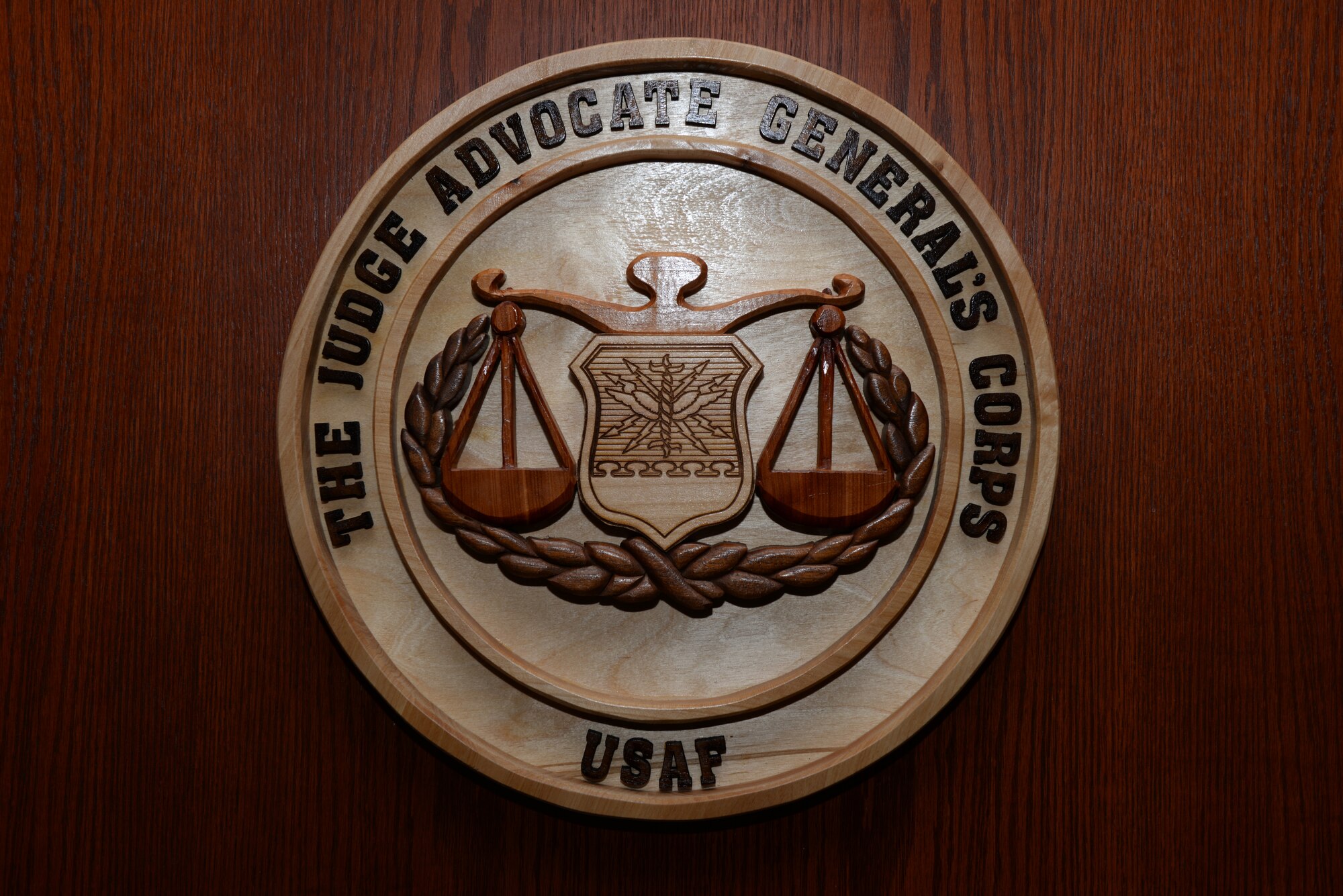 The seal of the Judge Advocate General Corps is displayed inside the 28th Bomb Wing courtroom at Ellsworth Air Force Base, S.D., July 17, 2018. The Ellsworth Judge Advocate office serves as the legal advisor for the 28th Bomb Wing. They handle issues including administrative law, government contracting and military law. (U.S. Air Force photo by Airman 1st Class Nicolas Z. Erwin)
