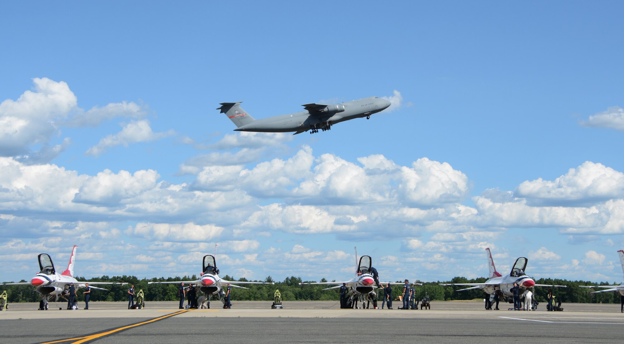 A Westover C-5M Super Galaxy flies over the Thunderbirds July 12, 2018, at Westover ARB. The Thunderbirds highlighted the Great New England Air and Space Show July 14th and 15th
