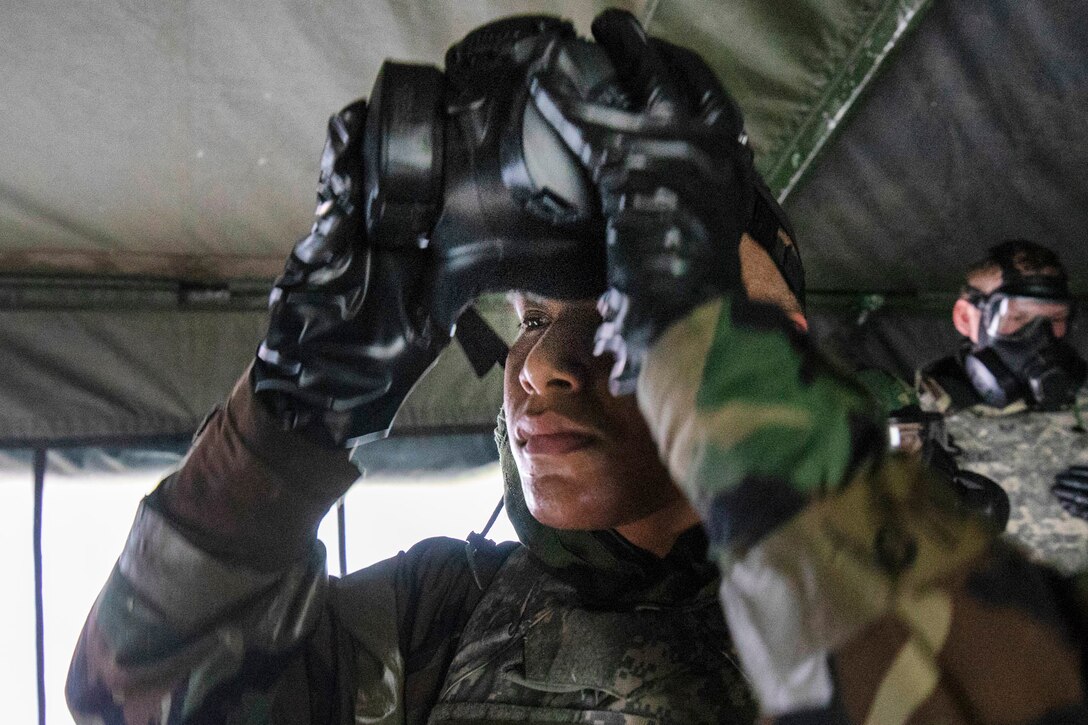 An airman undergoes gas mask training.
