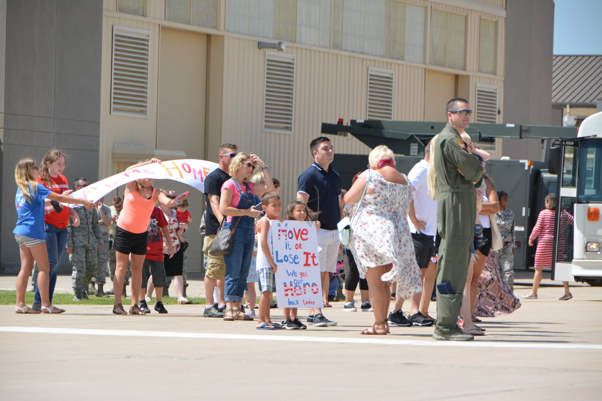 Family, friends, and co-workers await the arrival of a deployed group of U.S. Air Force Reserve Citizen Airmen assigned to the 507th Air Refueling Wing (ARW) at Tinker Air Force Base, Okla., July 3, 2018. More than 100 Reserve Citizen Airmen from the 507th ARW deployed to Incirlik Air Base, Turkey, in support of air operations. (U.S. Air Force photo by Tech. Sgt. Samantha Mathison)