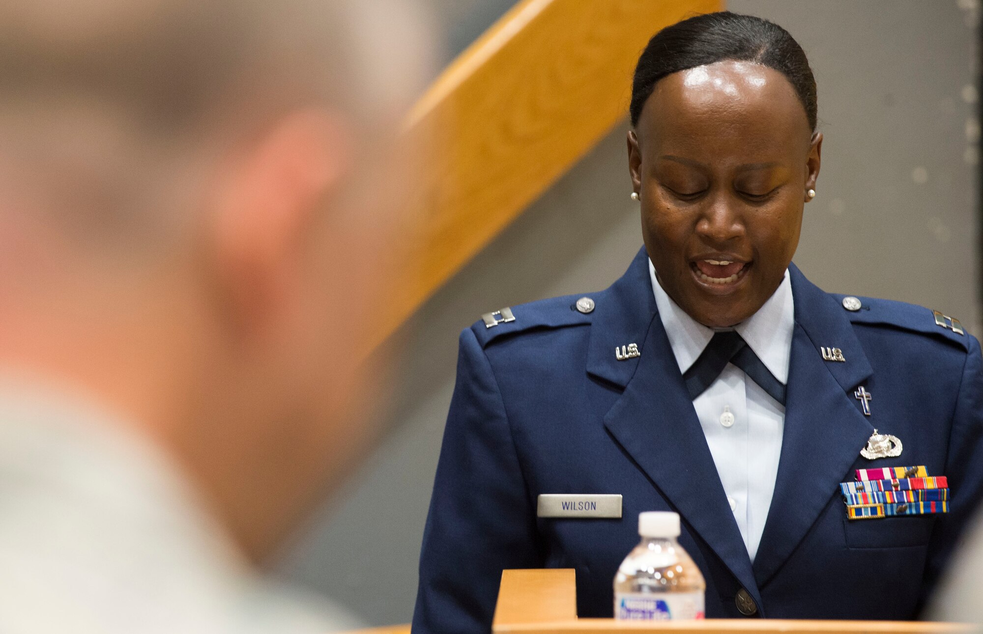 Chaplain (Capt.) Meoshia Wilson, 67th Cyberspace Wing, provides the invocation during the promotion ceremony for Brig. Gen. Michelle Hayworth, Air Forces Cyber vice commander, at Joint Base San Antonio-Lackland, Texas, July 16, 2018. In June, Hayworth re-joined AFCYBER from Air Force Space Command. She previously served in AFCYBER, most recently as the 688th Cyberspace Wing Commander. (U.S. Air Force photo by Tech. Sgt. R.J. Biermann)