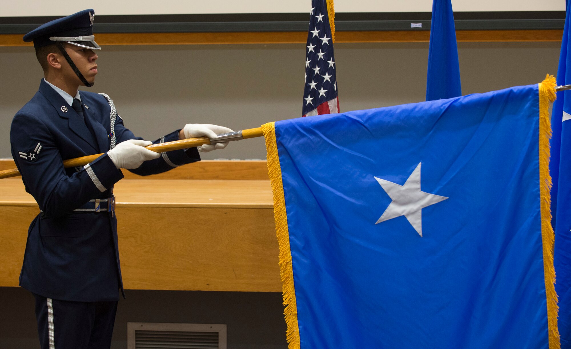 The Joint Base San Antonio-Lackland Honor Guard unfurls Air Forces Cyber Vice Commander Brig. Gen. Michelle Hayworth’s flag during her promotion ceremony at JBSA-Lackland, Texas, July, 16, 2018. In June, Hayworth re-joined AFCYBER from Air Force Space Command. She previously served in AFCYBER, most recently as the 688th Cyberspace Wing Commander. (U.S. Air Force photo by Tech. Sgt. R.J. Biermann)