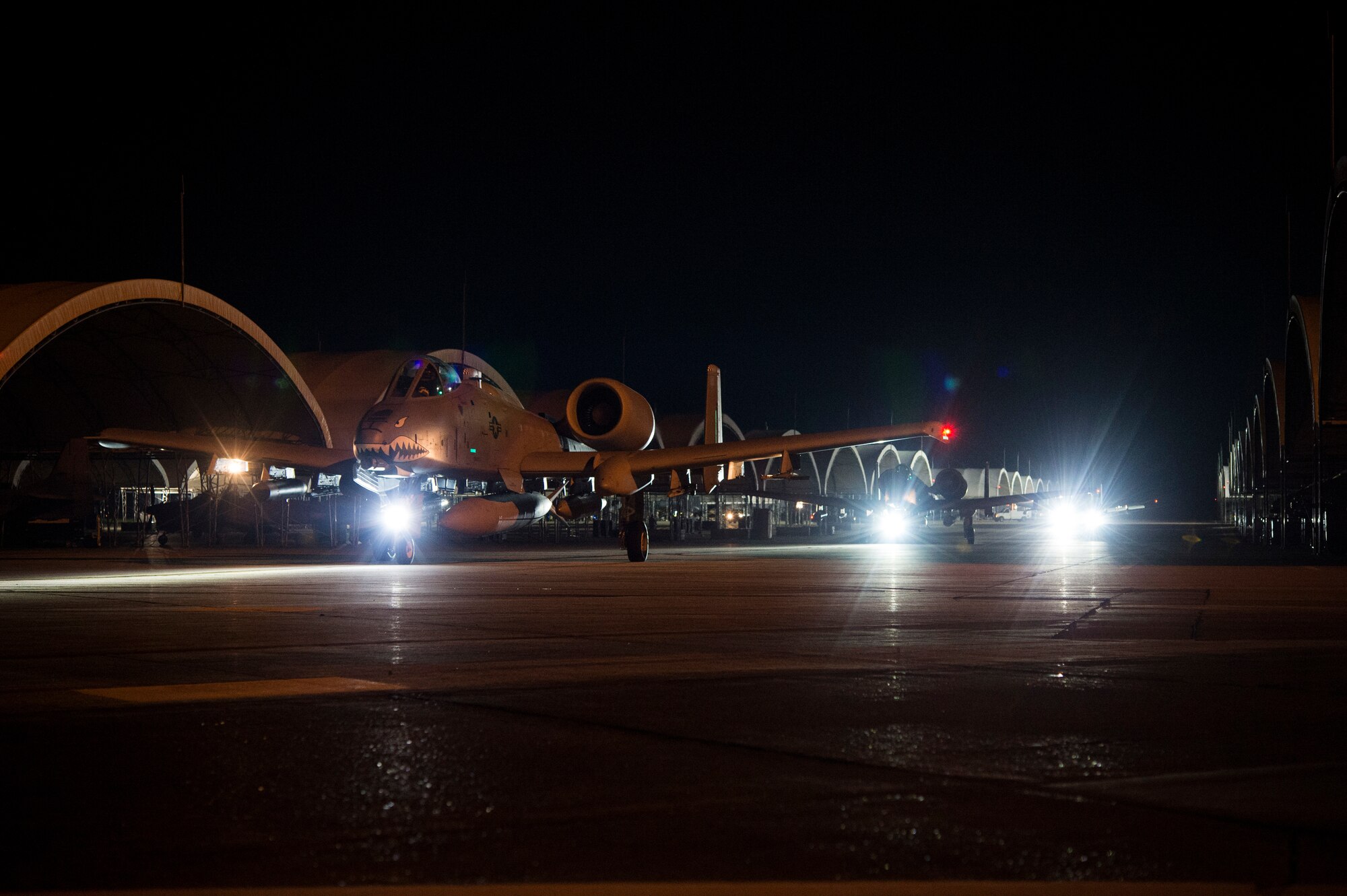 A-10C Thunderbolt IIs taxi down the flightline, July 9, 2018, at Moody Air Force Base, Ga. Airmen from the 75th Fighter Squadron (FS) and supporting units deployed to an undisclosed location in support of Operation Spartan Shield. (U.S. Air Force photo by Andrea Jenkins)