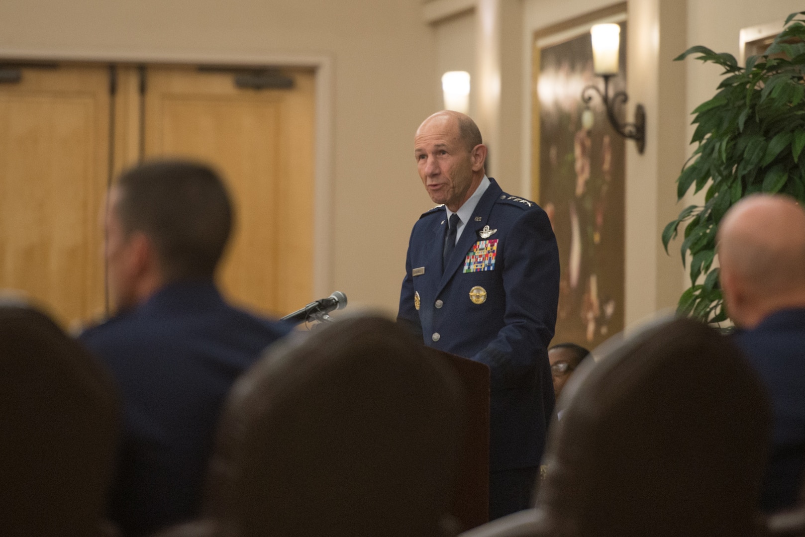 Gen. Mike Holmes, commander of Air Combat Command, addresses attendees during a command transfer and change of command ceremony at Joint Base San Antonio-Lackland, Texas, July 17, 2018. The command transfer realigned the 24th Air Force cyber operations under ACC alongside 25th AF intelligence, surveillance and reconnaissance missions; all to “drive faster decisions as we fight,” said Secretary of the Air Force Heather Wilson, in a June 7 statement. (U.S. Air Force photo by Andrew C. Patterson)