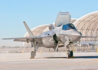 Third Marine Aircraft Wing's first F-35B taxis in Fri., Nov. 16, 2012 at approximately 1 p.m. on the Marine Corps Air Station Yuma flightline.  Piloted by F-35 pilot instructor Maj. A. C. Liberman, today's arrival highlights next week's official re-designation of Marine All Weather Fighter Attack Squadron 121, an F/A-18 Hornet Squadron, as the world's first operational F-35 squadron at MCAS Yuma.  The F-35B accomplishes the multi-role, fifth-generation capabilities needed across the full spectrum of military operations to deter potential adversaries and protect our nation and its interests.  Known as the F-35 Lightning II, the F-35B will eventually replace the Corps' aging legacy tactical fleet of AV-8B Harriers, F/A-18 Hornets and EA-6B Prowlers.
