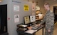 Airman 1st Class Noah Carlton, 60th Force Support Squadron, uses an x-ray machine to inspect the content of packages processed through the Official Mail Center, May 5, 2018, Travis Air Force Base, Calif.   The 60 FSS OMC is responsible for processing mail for Travis AFB, David Grant USAF Medical Center, and commercial company deliveries. (U.S. Air Force Photo by Heide Couch)