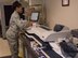 Staff Sgt. Brandi Alexander, 60th Force Support Squadron, uses a machine to mass print envelops May 5, 2018, Travis Air Force Base, Calif. The 60 FSS Official Mail Center is responsible for processing mail for Travis AFB, David Grant USAF Medical Center, and commercial company deliveries. (U.S. Air Force Photo by Heide Couch)