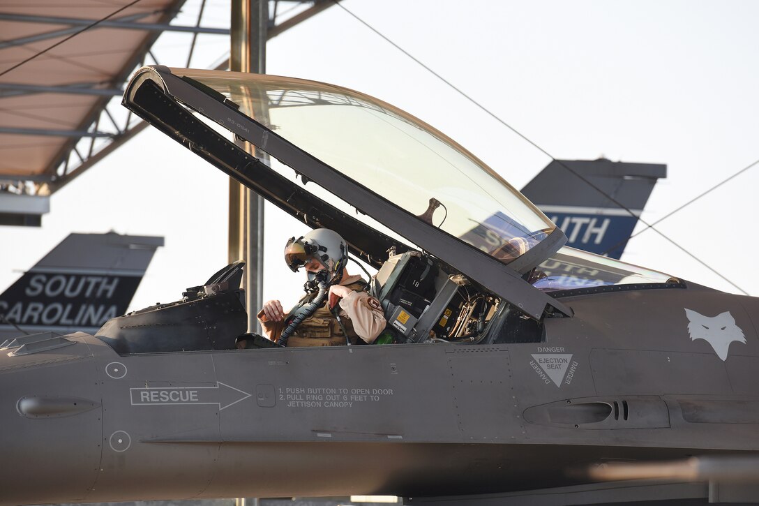 A pilot begins start-up procedures for his F-16 Fighting Falcon.