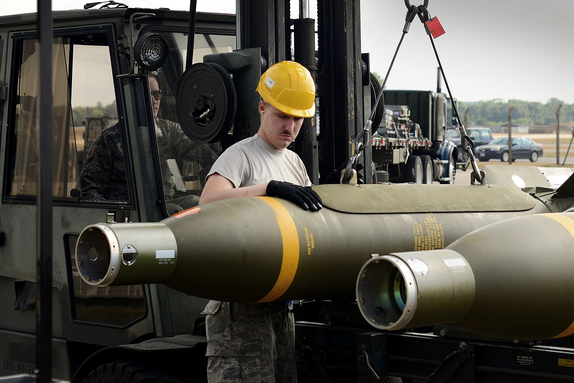 A 48th Fighter Wing munitions Airman prepares a GBU-24 Paveway III laser-guided bomb for transport during the United States Air Forces in Europe-Air Forces Africa’s inaugural Combat Ammunition Production Exercise July 17, 2018. During the exercise, munitions experts demonstrated their ability to build a variety of munitions including joint air-to-surface standoff missiles, air-to-air missiles, joint direct attack munitions, laser-guided bombs and small diameter bombs. (U.S. Air Force photo/ Tech. Sgt. Matthew Plew)
