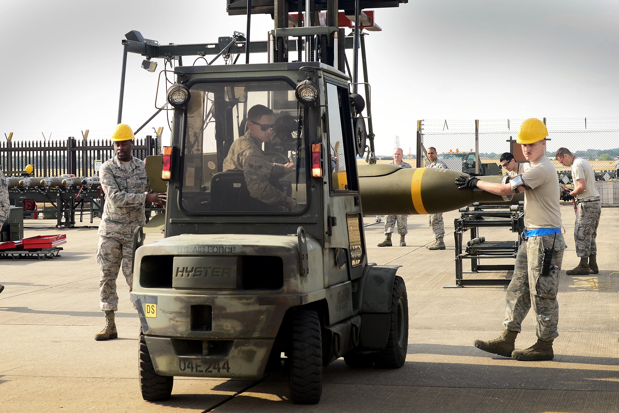 U.S. Air Force Munitions Airmen prepare a GBU-24 Paveway III laser-guided bomb for transport during the United States Air Forces in Europe-Air Forces Africa’s inaugural Combat Ammunition Production Exercise July 17, 2018. The 48th Fighter Wing Maintenance Group hosted approximately 160 Airmen from the 9th Munitions Squadron, Beale Air Force Base, Calif., 31st MXG, Aviano Air Base, Italy, 52nd MXG, Spangdahlem AB, Germany, 86th Logistics Readiness Group, Ramstein AB, Germany, and the 422nd Air Base Group, 501st Combat Support Wing, RAF Alconbury, England to participate in the training. (U.S. Air Force photo/ Tech. Sgt. Matthew Plew)