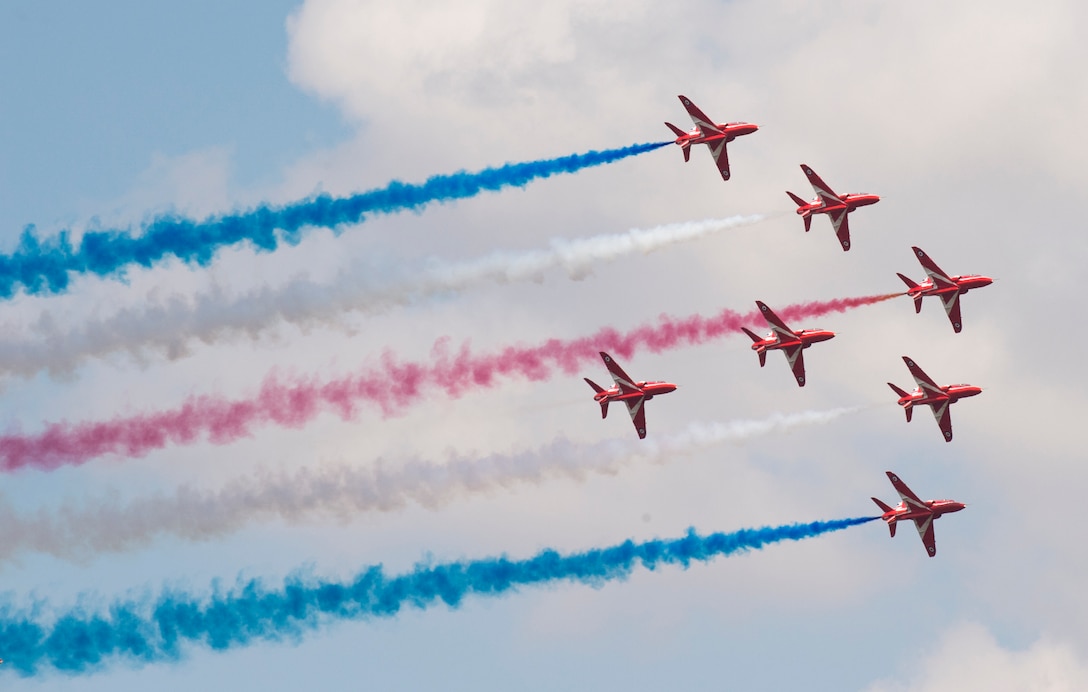 Pilots with the Royal Air Force Red Arrows Aerobatic Team demonstrate the capabilities of the BAe Hawk T1/T1As aircraft during the 2018 Royal International Air Tattoo (RIAT) at RAF Fairford, United Kingdom (UK) on July 14, 2018. This year’s RIAT celebrated the 100th anniversary of the RAF and highlighted the United States’ ever-strong alliance with the UK. (U.S. Air Force photo by TSgt Brian Kimball)