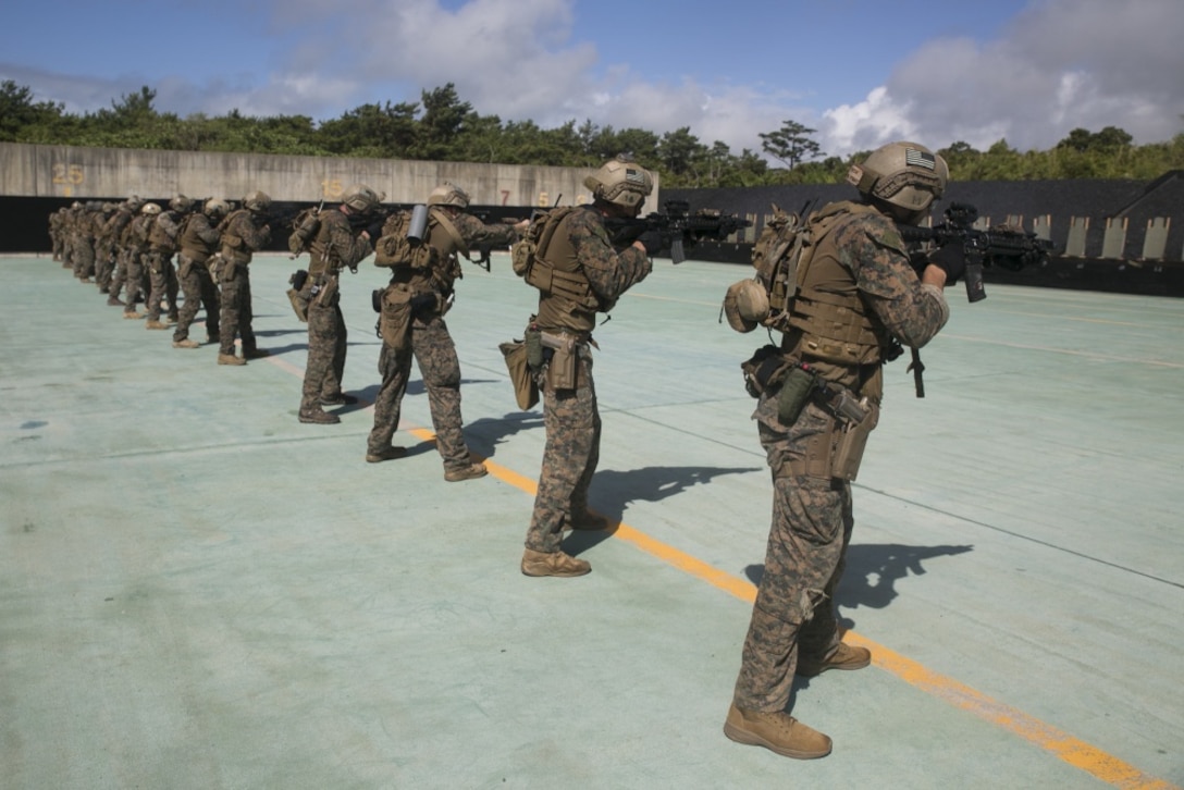 Marines with the 31st Marine Expeditionary Unit’s Force Reconnaissance Platoon fire M4 carbines during marksmanship training as part of Realistic Urban Training Exercise at Camp Hansen, Okinawa, Japan, July 17, 2018.