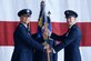 U.S. Air Force Col. Eric Paulson, 55th Operations Group (OG) commander, assumes command of the 55th OG from U.S. Air Force Col. Michael Manion, 55th Wing commander, during a change of command ceremony July 13, 2018, at Offutt Air Force Base, Nebraska. The group executes global airborne intelligence, surveillance and reconnaissance, and treaty verification missions directed by the President, Secretary of Defense, Joint Chiefs of Staff, Combatant Commanders, and national intelligence agencies. (U.S. Air Force photo by Charles J. Haymond)