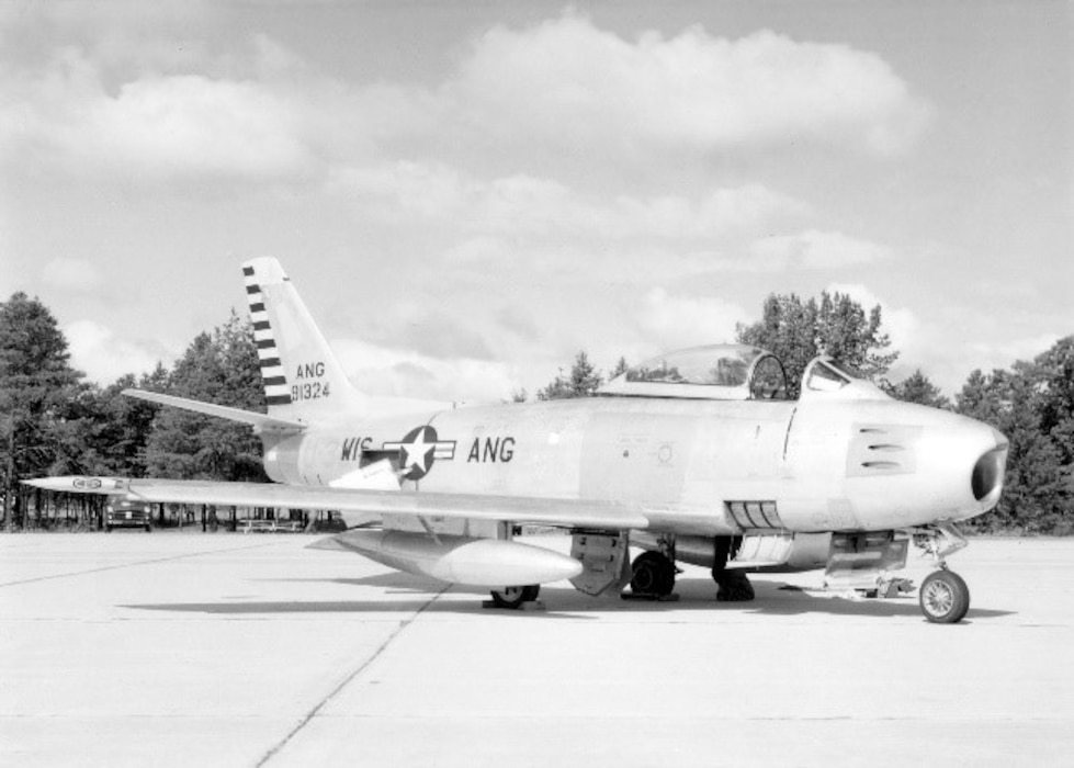 An F-86 Sabre is positioned on a flight line in the mid-1950's. The 115th Fighter Wing, then called the 176th Fighter Squadron, began receiving the F-86A Sabres in October 1953.