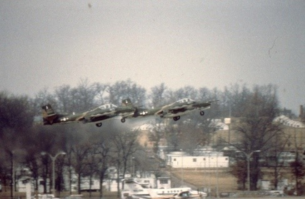 Two OA-37 Dragonflies take off near Truax Field.