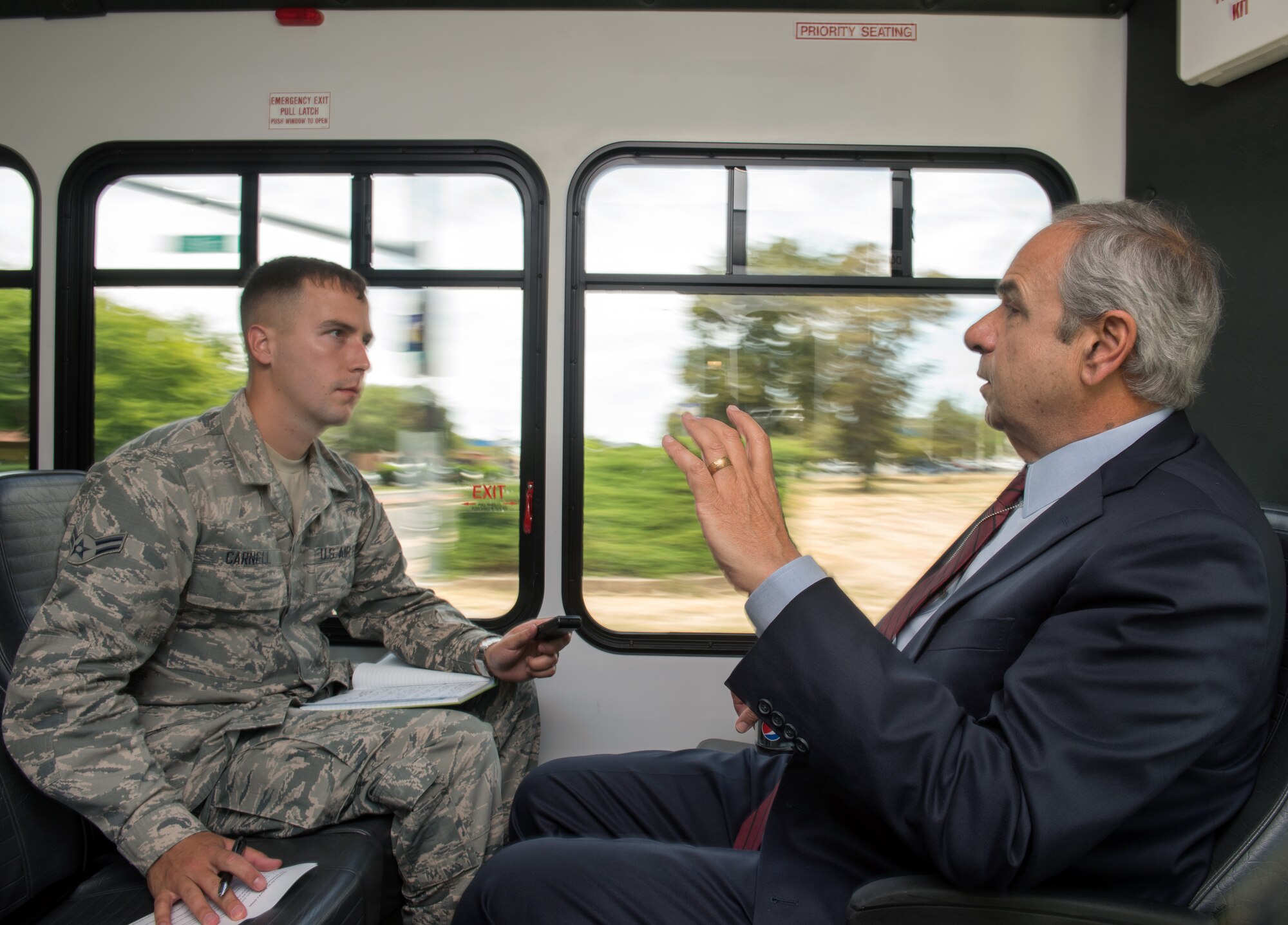 U.S. Air Force Airman 1st Class Jonathon Carnell, 60th Air Mobility Wing conducts an interview with Dr. Richard Joseph, Chief Scientist of the United States Air Force, Washington, D.C., during his visit to Travis Air Force Base, Calif., July 12, 2018. Joseph toured David Grant USAF Medical Center, Phoenix Spark lab and visited with Airmen. Joseph serves as the chief scientific adviser to the Chief of Staff and Secretary of the AF, and provides assessments on a wide range of scientific and technical issues affecting the AF mission. (U.S. Air Force photo by Louis Briscese)