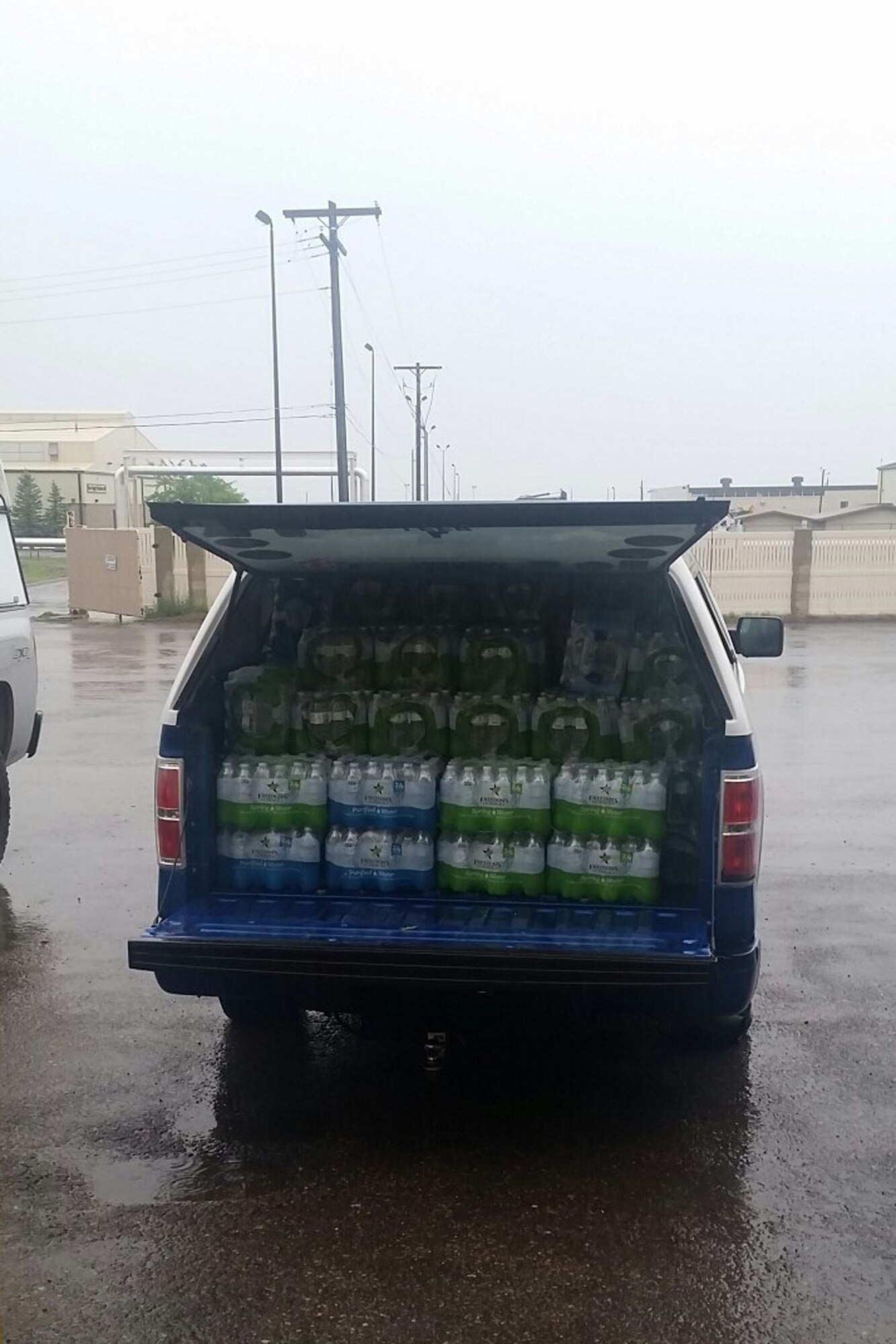 Displayed are 107 cases of water that made the trip from Malmstrom Air Force Base, Mont., to Salem, Oregon.