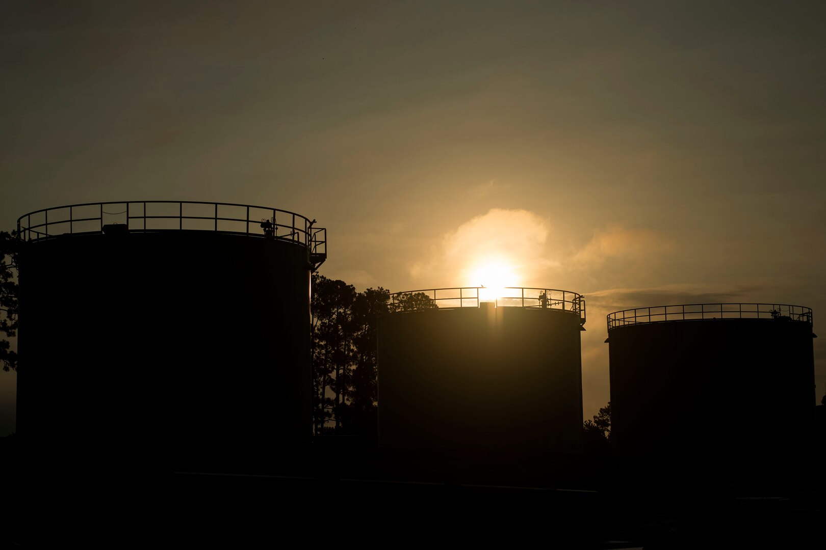 Above-ground jet fuel storage tanks rest in the 23d Logistics Readiness Squadron (LRS) fuel yard, July 18, 2018, at Moody Air Force Base, Ga. For the first time since the 1950s, the 23d LRS is modernizing the yard to improve fuel efficiency to enhance operations. (U.S. Air Force photo by Airman 1st Class Erick Requadt)