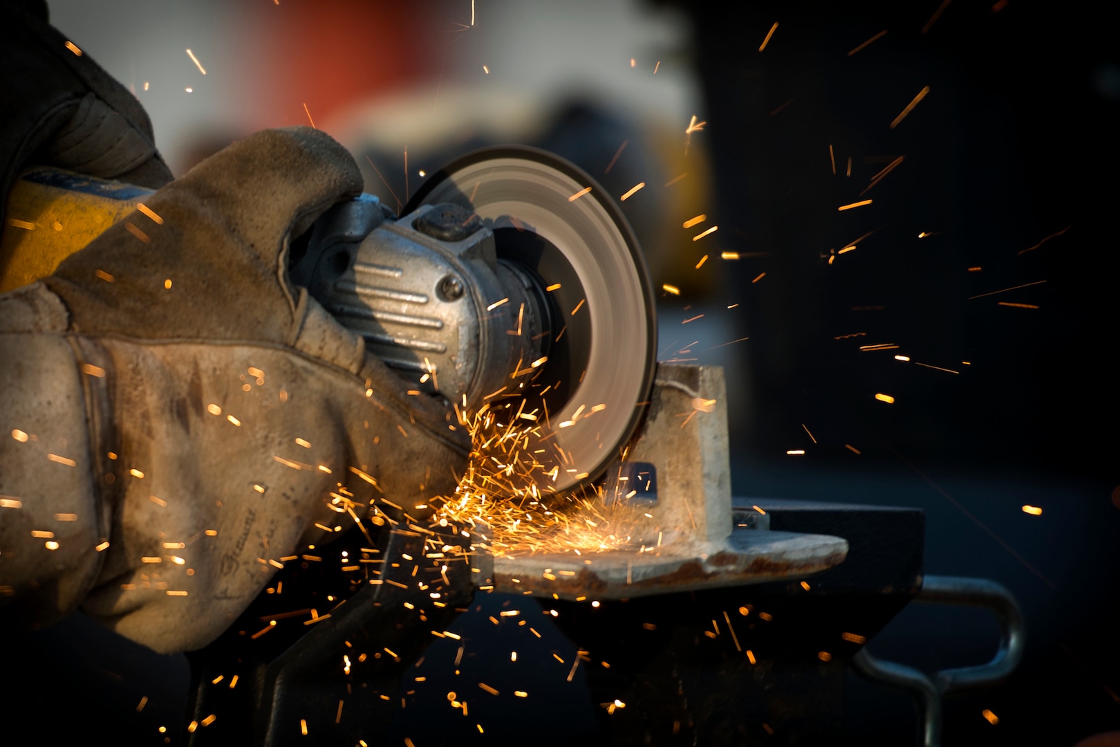 Brent Stone, a civilian welder, grinds a pipe for upgrade in the 23d Logistics Readiness Squadron (LRS) fuel yard, July 18, 2018, at Moody Air Force Base, Ga. For the first time since the 1950s, the 23d LRS is modernizing the yard to improve fuel efficiency to enhance operations. (U.S. Air Force photo by Airman 1st Class Erick Requadt)