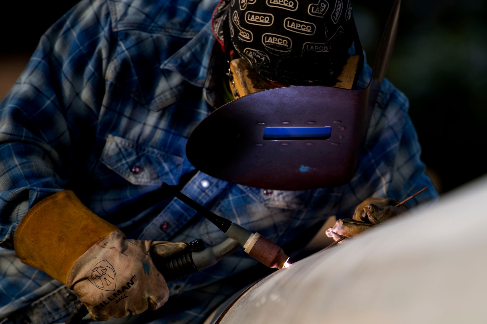Michael Martin, a civilian welder, performs welding work on a pipe in the 23d Logistics Readiness Squadron (LRS) fuel yard, July 18, 2018, at Moody Air Force Base, Ga. For the first time since the 1950s, the 23d LRS is modernizing the yard to improve fuel efficiency to enhance operations. (U.S. Air Force photo by Airman 1st Class Erick Requadt)