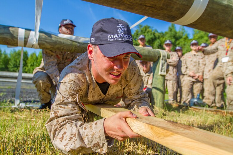 John Denunzio, a student at West Irondequoit High school in Rochester, New York, negotiates an an obstacle while navigating a leadership reaction course during Marine Corps Recruiting Command’s 2018 Summer Leadership and Character Development Academy aboard Marine Corps Base Quantico, Virginia, July 19. More than 200 students were accepted into the academy, hand-selected by a board of Marines who look to find attendees with similar character traits as Marines. Inspired by the Marine Corps' third promise of developing quality citizens, the program was designed to challenge and develop the nation's top-performing high school students so they could return to their communities more confident, selfless and better equipped to improve the lives of those around them. (U.S. Marine Corps photo by LCpl. Phuchung Nguyen)