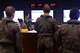 61st Fighter Squadron pilots, including Australians, brief at the operations desk before stepping to their F-35A Lightning IIs for a transitional training sortie July 18, 2018, at Luke Air Force Base, Ariz. Transitional training helps pilots experienced in flying other air frames adapt to the F-35. (U.S. Air Force photo by Senior Airman Ridge Shan)