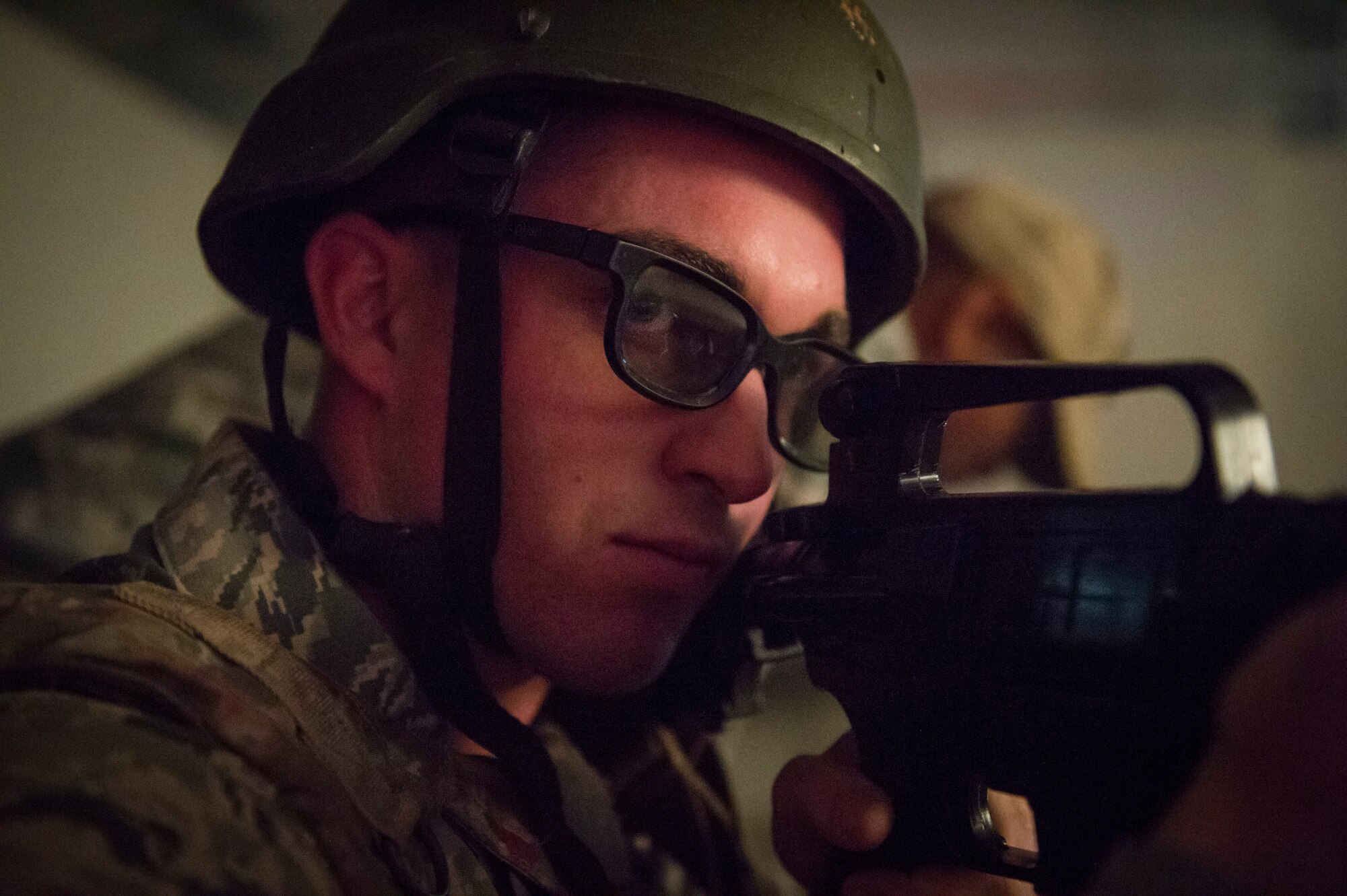 An Airman from the 59th Medical Wing performs sentry duty during a combat simulation as part of the Ability to Survive and Operate course Oct. 10, 2017, at Joint Base San Antonio-Lackland, Texas. The ATSO course takes Airmen from the 59th Medical Wing out of their traditional patient centric clinics and places them into a realistic combat settings and scenarios they may encounter in the real world. (U.S. Air Force photo by Senior Airman Keifer Bowes)