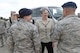 U.S. Air Force Senior Airman Brittanie Sabol, left, 100th Security Forces Squadron vehicle control officer, Secretary of the Air Force Heather Wilson, center, and Senior Master Sgt. Chadrick Hayden, 100th SFS operations superintendent speak about the new operations the 100th SFS have implemented at RAF Mildenhall, England, July 12, 2018. Secretary Wilson visited RAF Mildenhall to engage with Airmen from the 100th ARW and discuss innovations and strategy. (U.S. Air Force photo by Airman 1st Class Alexandria Lee)