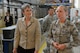 Secretary of the Air Force Heather Wilson, left, Senior Airman Nicole McCleary, 100th Logistics Readiness Squadron logistics planner, discuss a new innovation implemented on base at RAF Mildenhall, England, July 12, 2018. Secretary Wilson visited RAF Mildenhall to engage with Airmen from the 100th ARW and discussed innovations and strategy. (U.S. Air Force photo by Airman 1st Class Alexandria Lee)