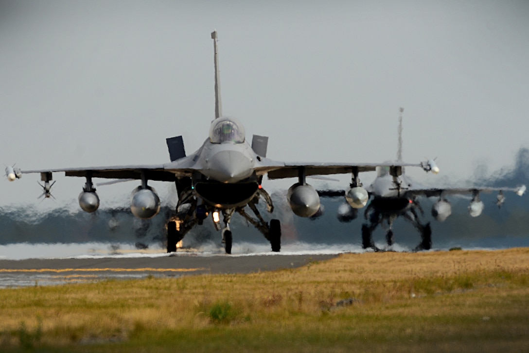 F-16 Fighting Falcons from the 31st Fighter Wing, 510th Fighter Squadron, Aviano Air Base, Italy land at Royal Air Force Lakenheath, England July 20, 2018. The 510th FS are participating in a bilateral training event to enhance interoperability, maintain joint readiness and reassure our regional allies and partners. (U.S. Air Force photo/Tech. Sgt. Matthew Plew)