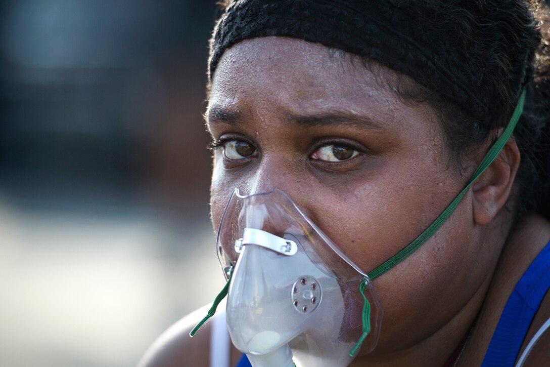 A simulated victim rests after being treated during a mass casualty exercise July 19, 2018, at Moody Air Force Base, Ga. The exercise tested the 23d Medical Group’s emergency response capabilities during a chemical attack. (U.S. Air Force photo by Senior Airman Janiqua P. Robinson)