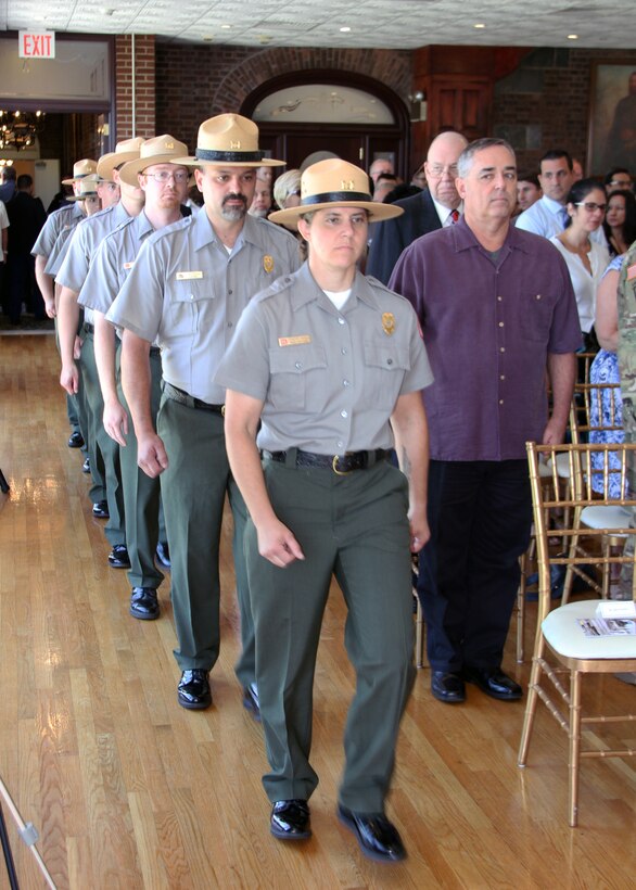 New England District flood risk management project park rangers march into the U.S. Army Corps of Engineers North Atlantic Division change-of-command ceremony at the Fort Hamilton Community Club in Brooklyn, New York at its conclusion.