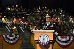 Army Lt. Gen. Timothy Kadavy, the director of the Army National Guard, speaks to more than 500 attendees during the Twilight Tattoo, July 18, 2018, at Joint Base Myer-Henderson Hall, Virginia. Kadavy served as host for the event, and recognized civilian employers of Guard members and administered the oath of enlistment to more than 50 future Soldiers.