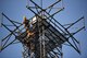 Airman Jacob Pugh and Airman 1st Class Brandon Culp, 14th Operations Support Squadron Radar, Airfield and Weather Systems (RAWS) journeymen, attach new wiring on a radio tower July 16, 2018, on Columbus Air Force Base, Mississippi. The RAWS unit supports base and regional radar equipment, ground-to-air radios and weather systems that support Air Traffic Control, the National Weather Service, and command and control across the wing. (U.S. Air Force photo by Airman 1st Class Keith Holcomb)