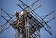 Airman Jacob Pugh and Airman 1st Class Brandon Culp, 14th Operations Support Squadron Radar, Airfield and Weather Systems (RAWS) journeymen, attach new wiring on a radio tower July 16, 2018, on Columbus Air Force Base, Mississippi. The RAWS unit supports base and regional radar equipment, ground-to-air radios and weather systems that support Air Traffic Control, the National Weather Service, and command and control across the wing. (U.S. Air Force photo by Airman 1st Class Keith Holcomb)