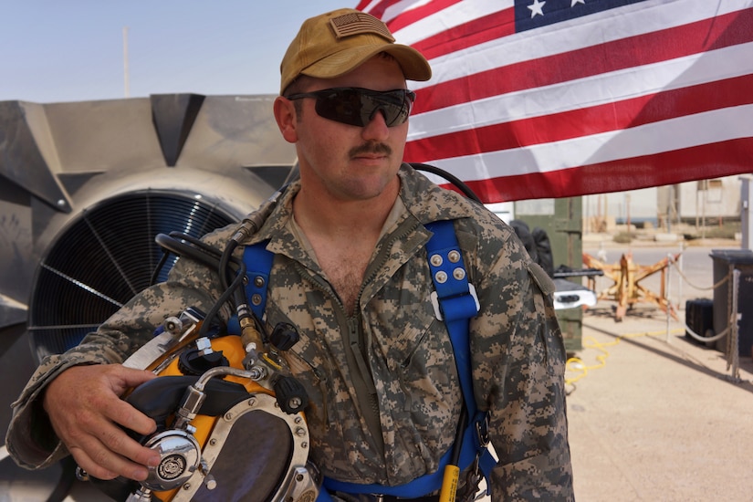 U.S. Army Spc. Joshua Staats a 2nd Class Diver assigned to the 74th Engineer Dive Detachment acts as the Standyby Diver as the emergency procedure route is being exercised at Kuwaiti Naval Base, Kuwait, May 11, 2018. The standby diver is another asset of a dive, providing a set of extra hands and eyes in case of a casualty at depth, and support for the primary diver in case of entrapment or fouling.