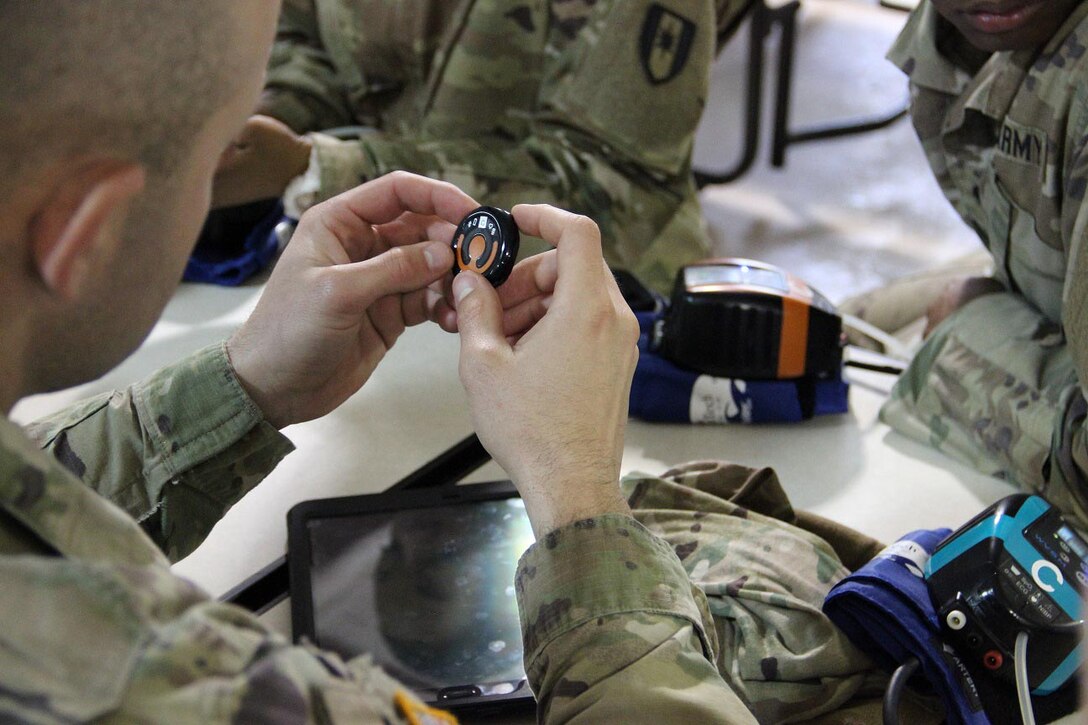 Soldiers use a MEDHUB telemedicine system.